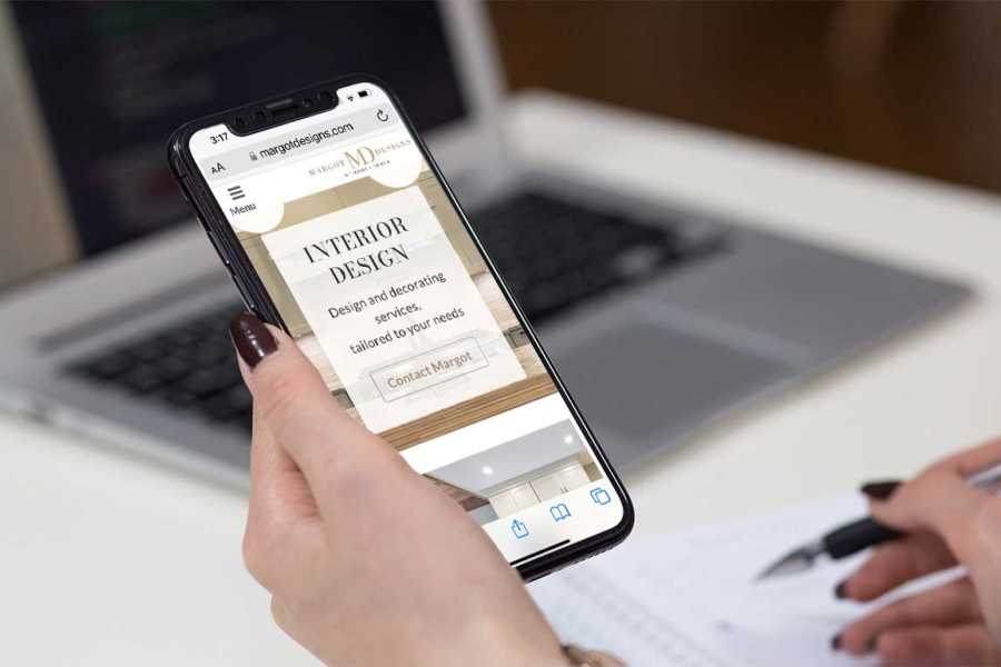 Margot Designs web site home page displayed on an iPhone.